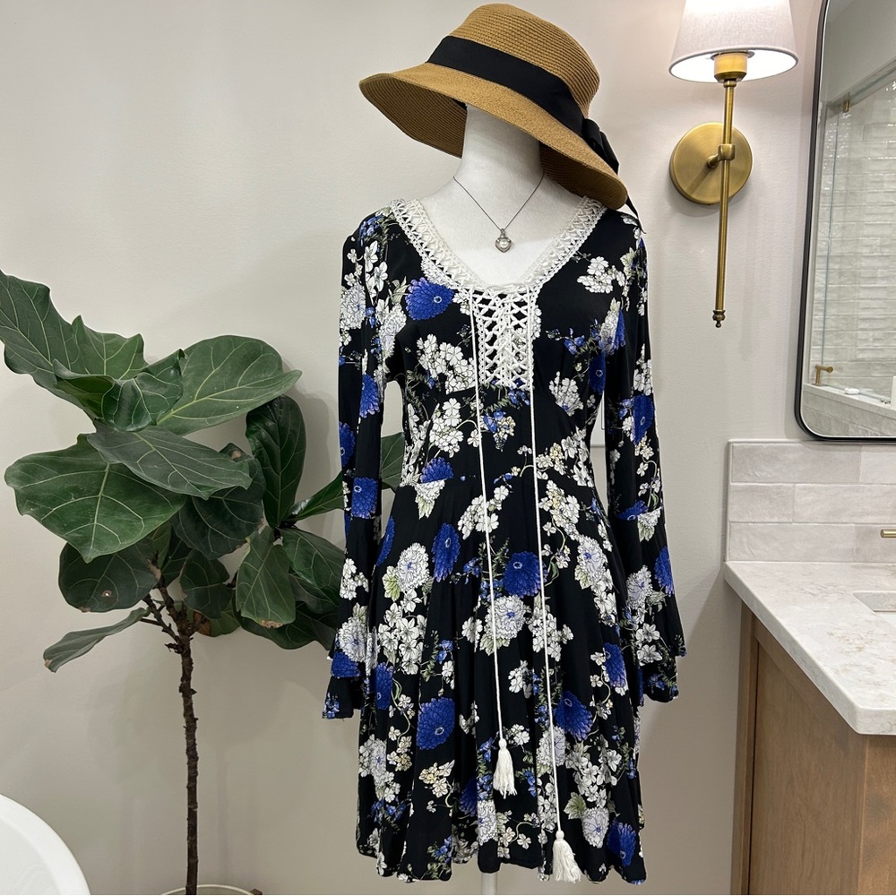 Floral, bell sleeved dress.